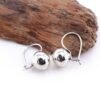Detail motif ukiran tradisional Marbilla pada anting wanita perak asli 925